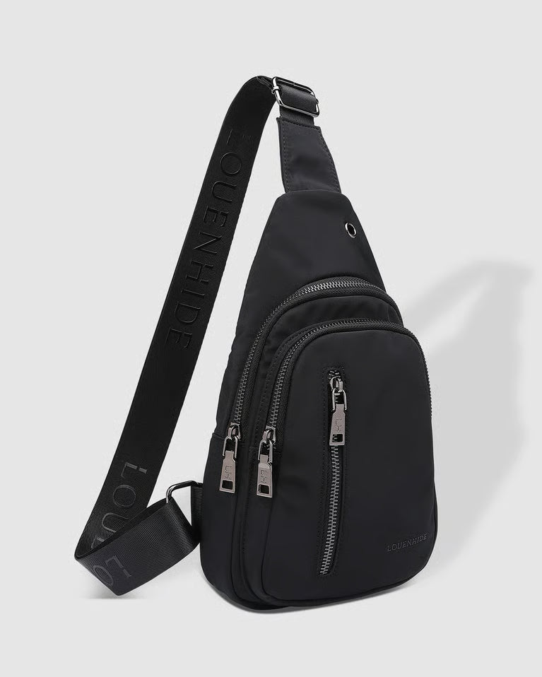 Black sling bag with visible brand name on a light gray background