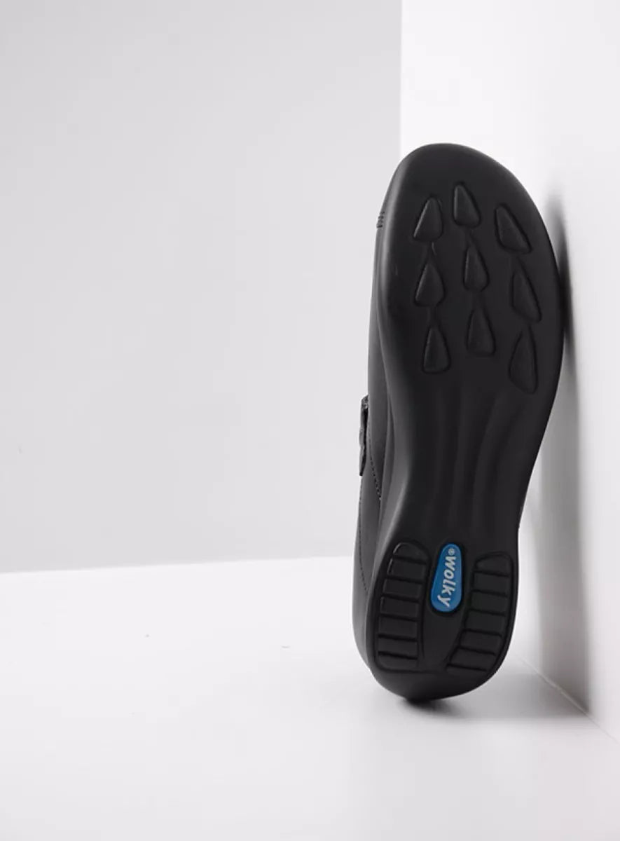 Black shoe sole with a brand logo on a white background