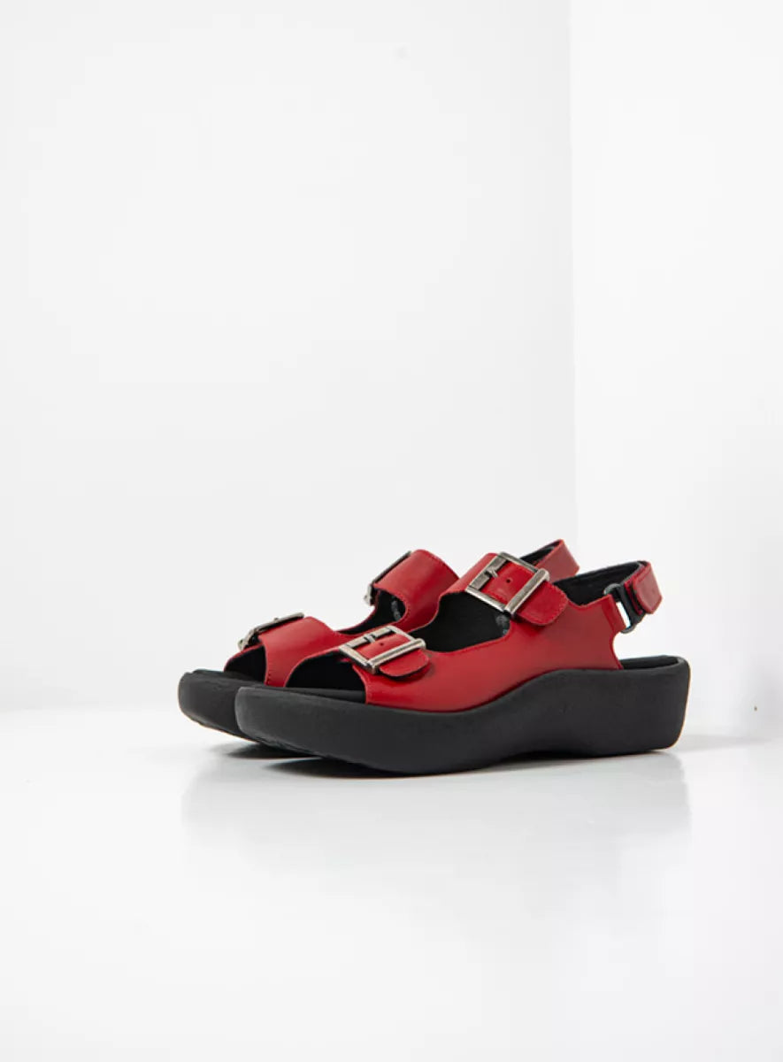 Red sandals with black sole.  Two adjustable velcro buckles as well as adjustable heel strap.