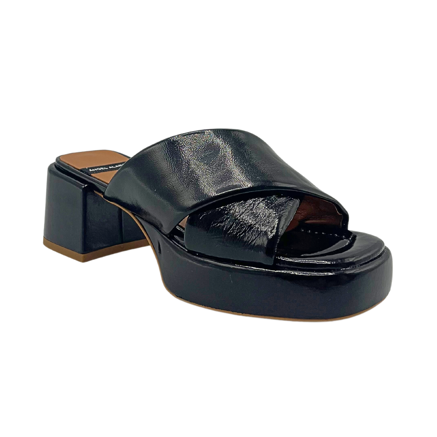 Angled side view of Angel Alarcon Muses in black patent leather.  Features wide cross strap detail.