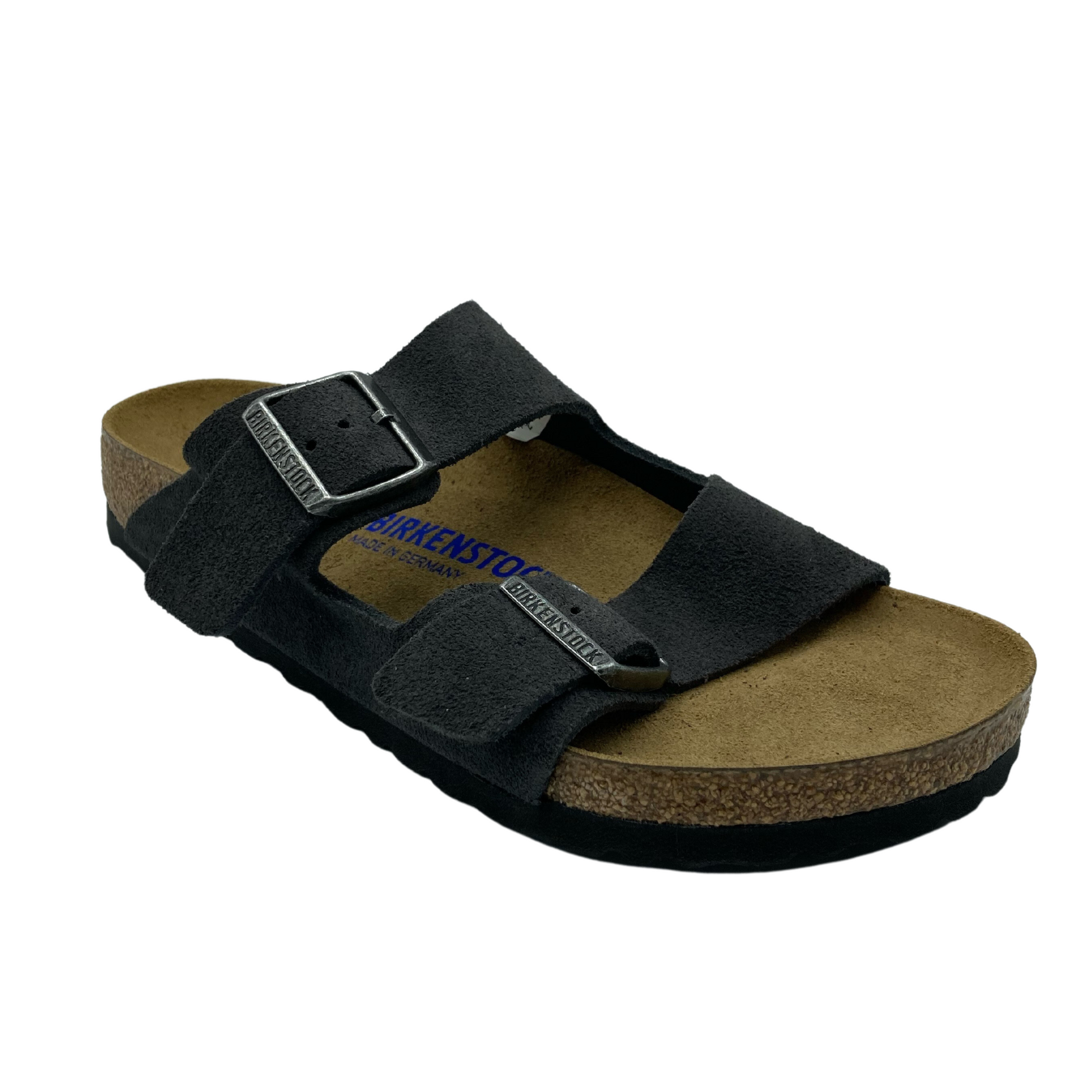 45 degree angled view of contoured footbed sandal with grey straps and silver buckles
