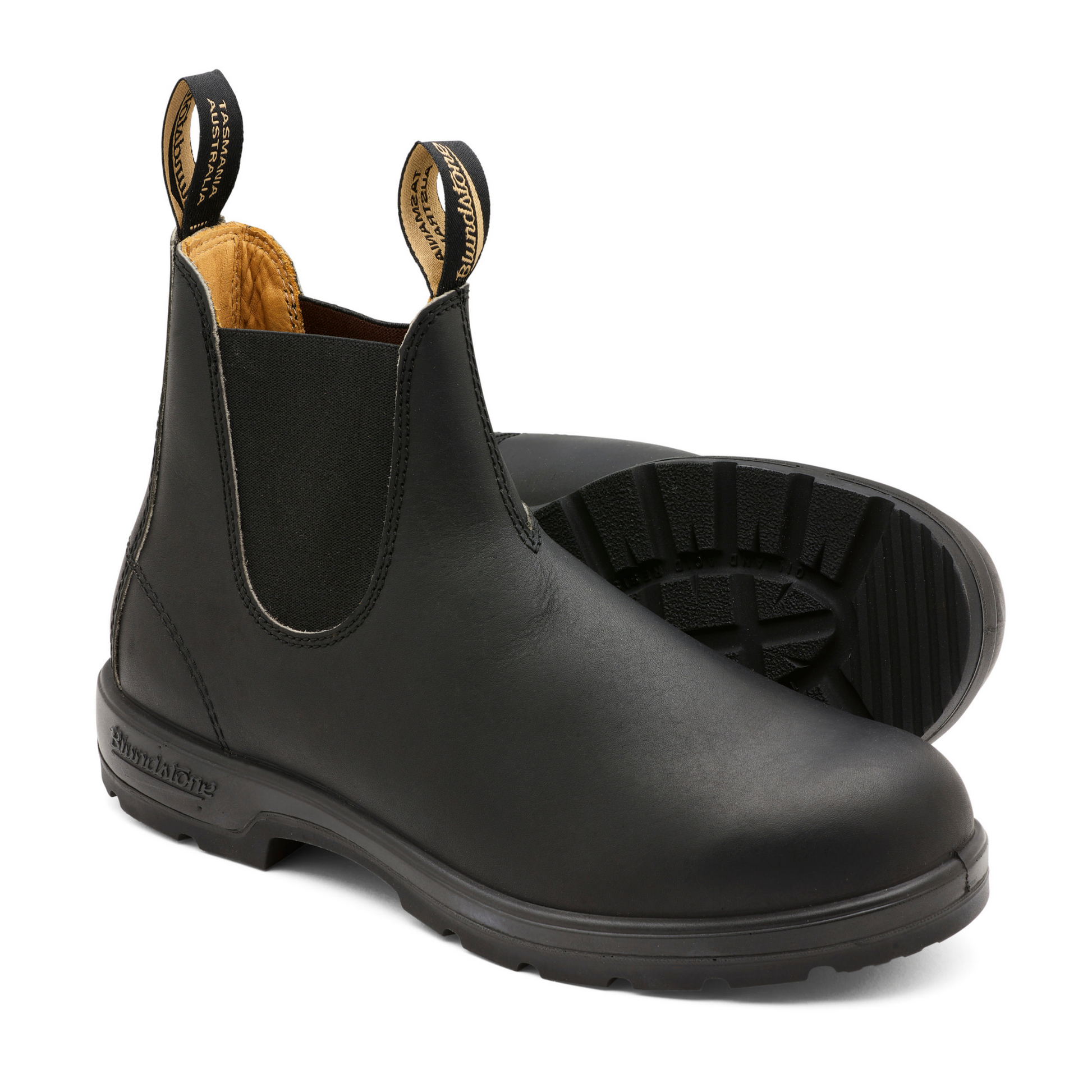 A pair of unisex, leather over-the-ankle height boots with tan coloured leather interior lining