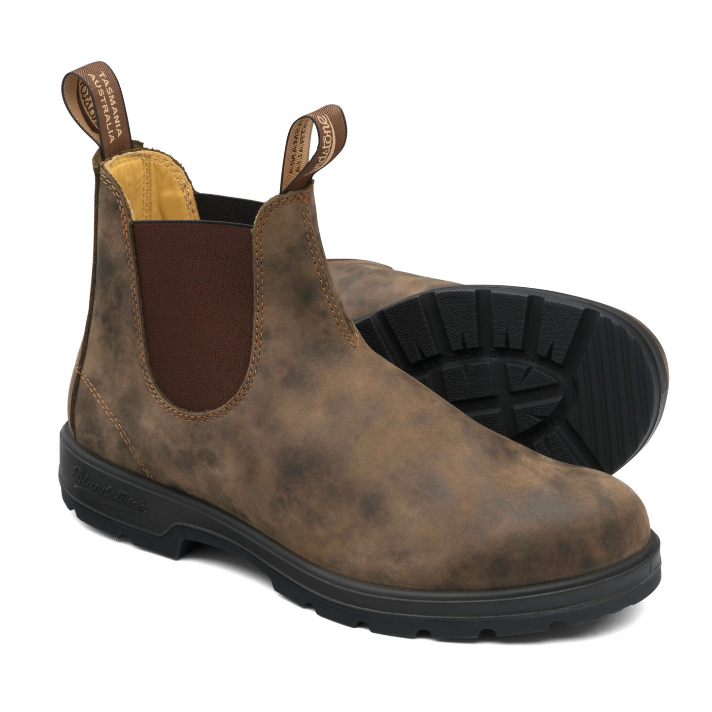 A pair of unisex leather boots. Black sole and brown, branded pull-on straps.
