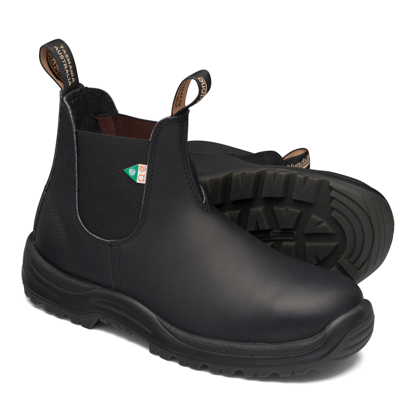 Pair of black boots with slip resistant, steel toe and black elastic sides.