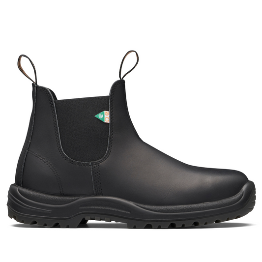 Side view of right boot. Black leather, over-the-ankle height boot with CSA greenpatch tag on elastic side