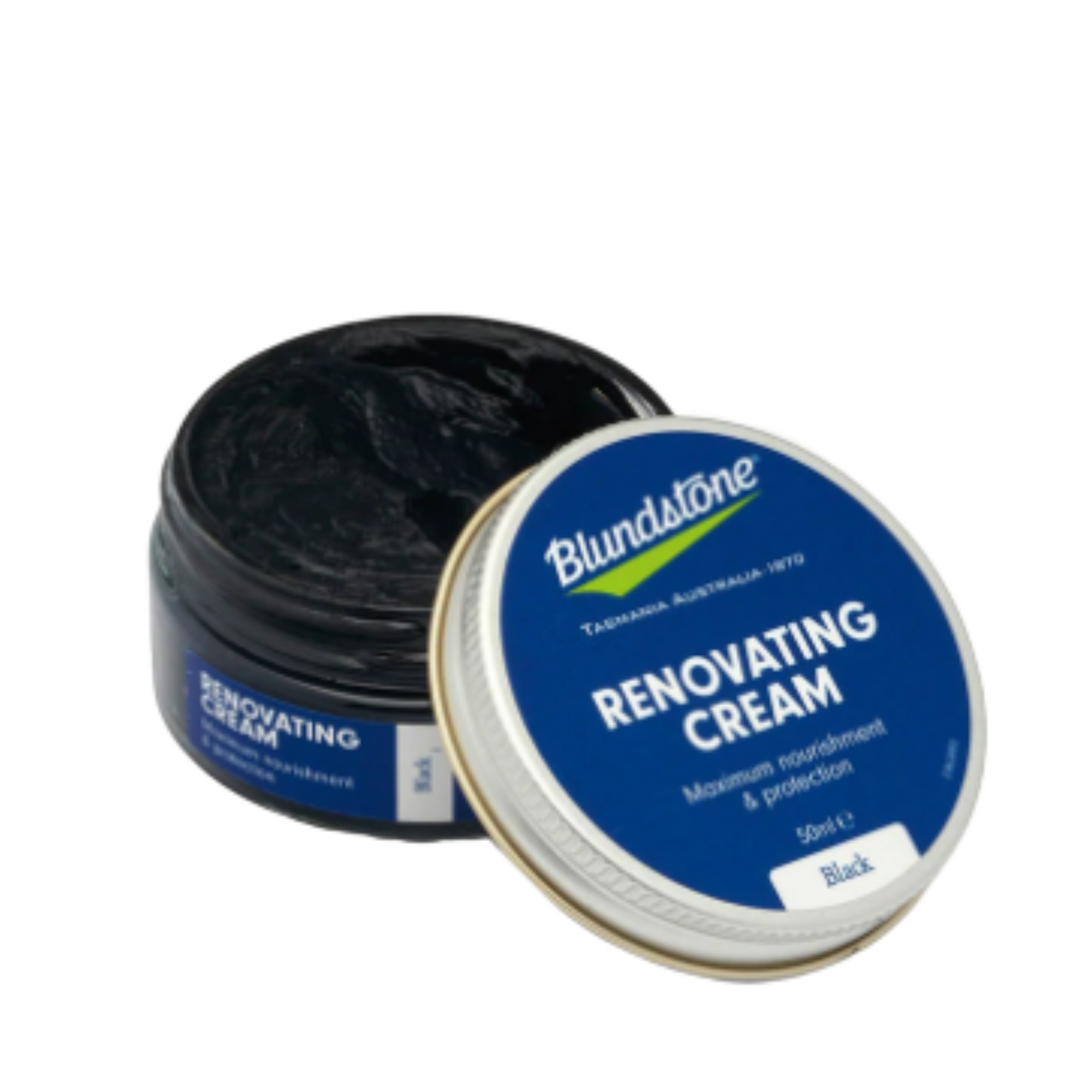 Open container of black renovating cream. Lid is leaning on the open jar.