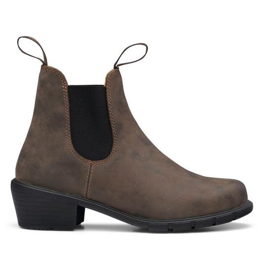 A side profile view of the right boot. Feminine, rustic brown, leather, heeled boots.