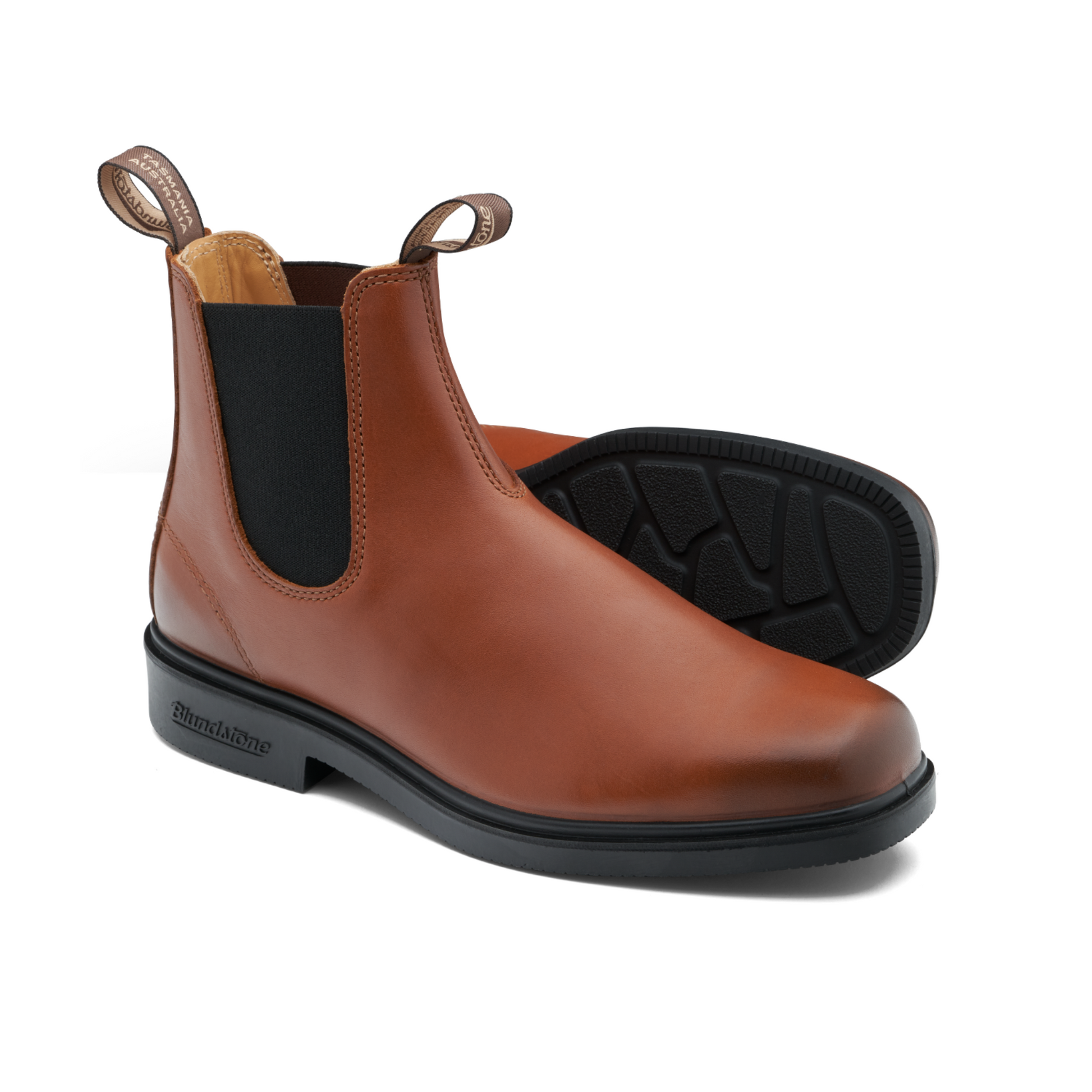 Pair of chisel toe, dress boot in Cognac by Blundstone