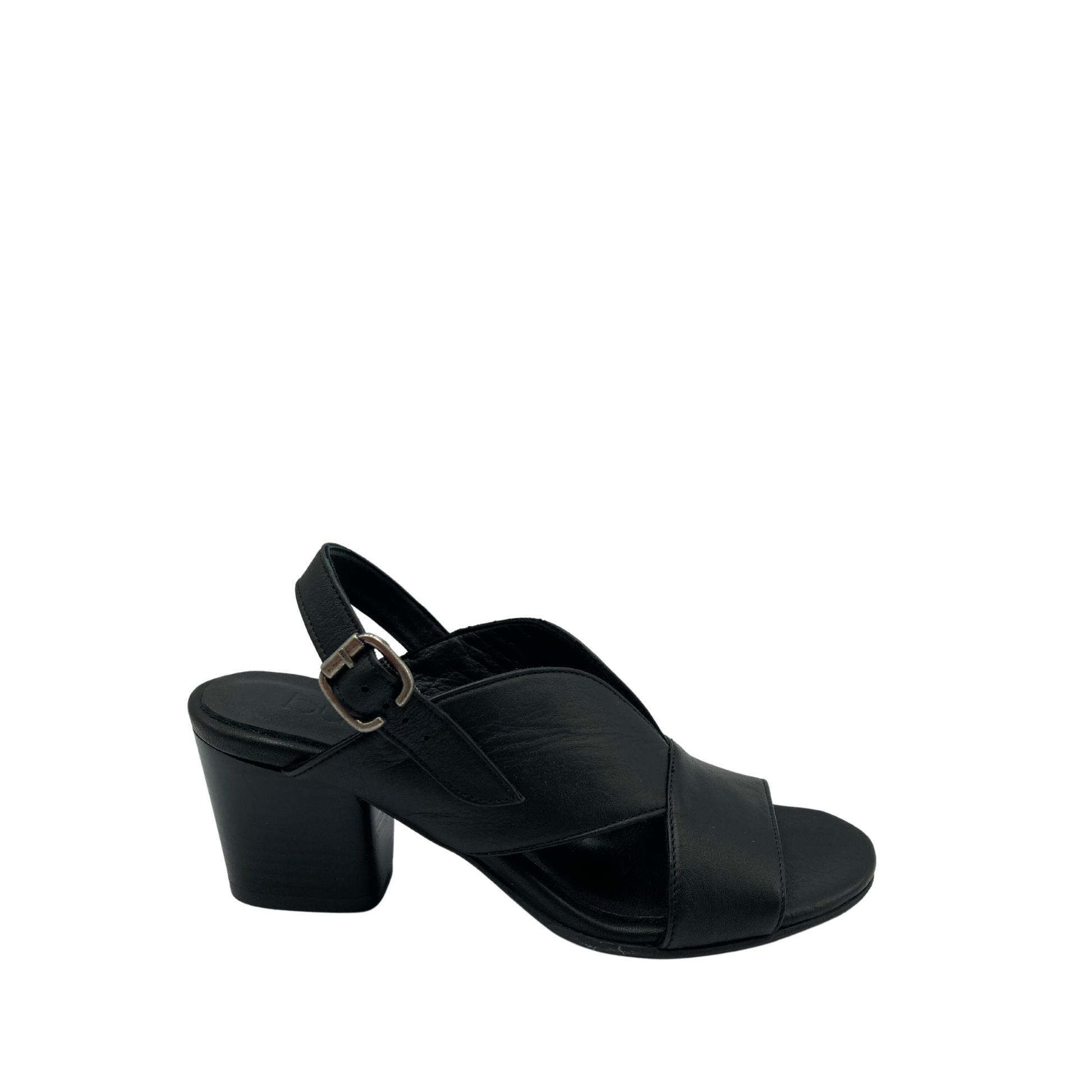 Outside view of black sandal with open toe and block heel