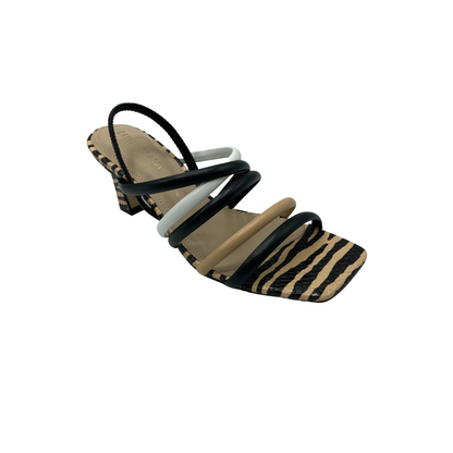 Strappy sandal in a combination of neutral colors - black, white taupe