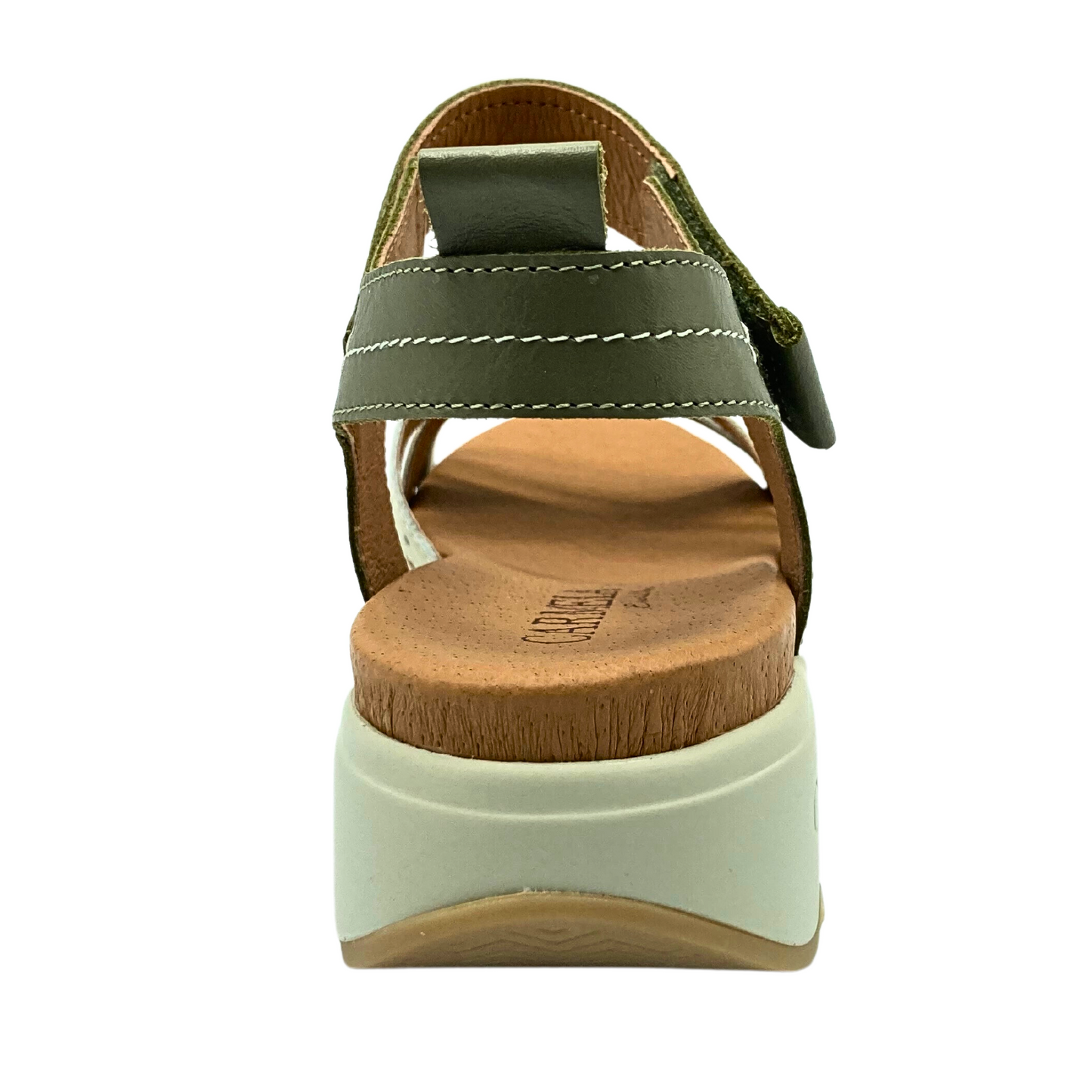 Rear view of low platform sandal by Carmela.  Solid wedge construction for and thick back strap make it a sturdy construction and easy to wear.