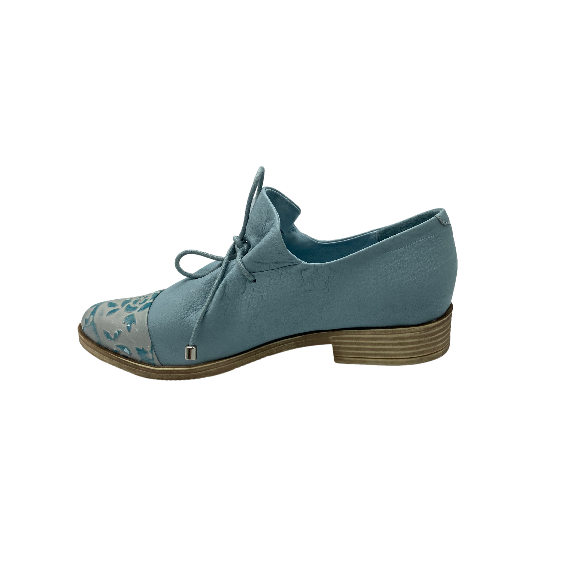 Inside view of the Kotty in denim blue with stacked low square heel