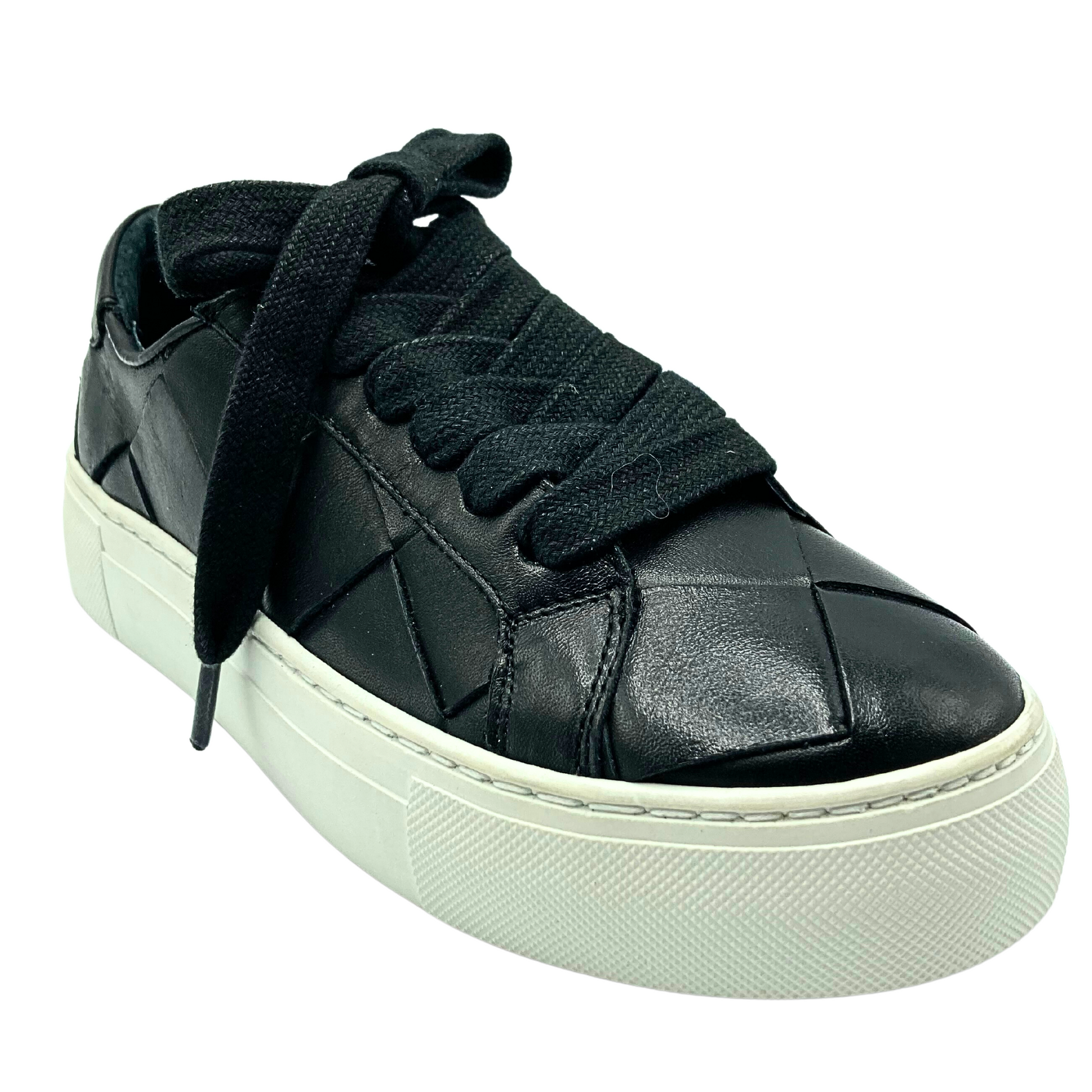 Angled front view of a fashion sneaker with a woven leather