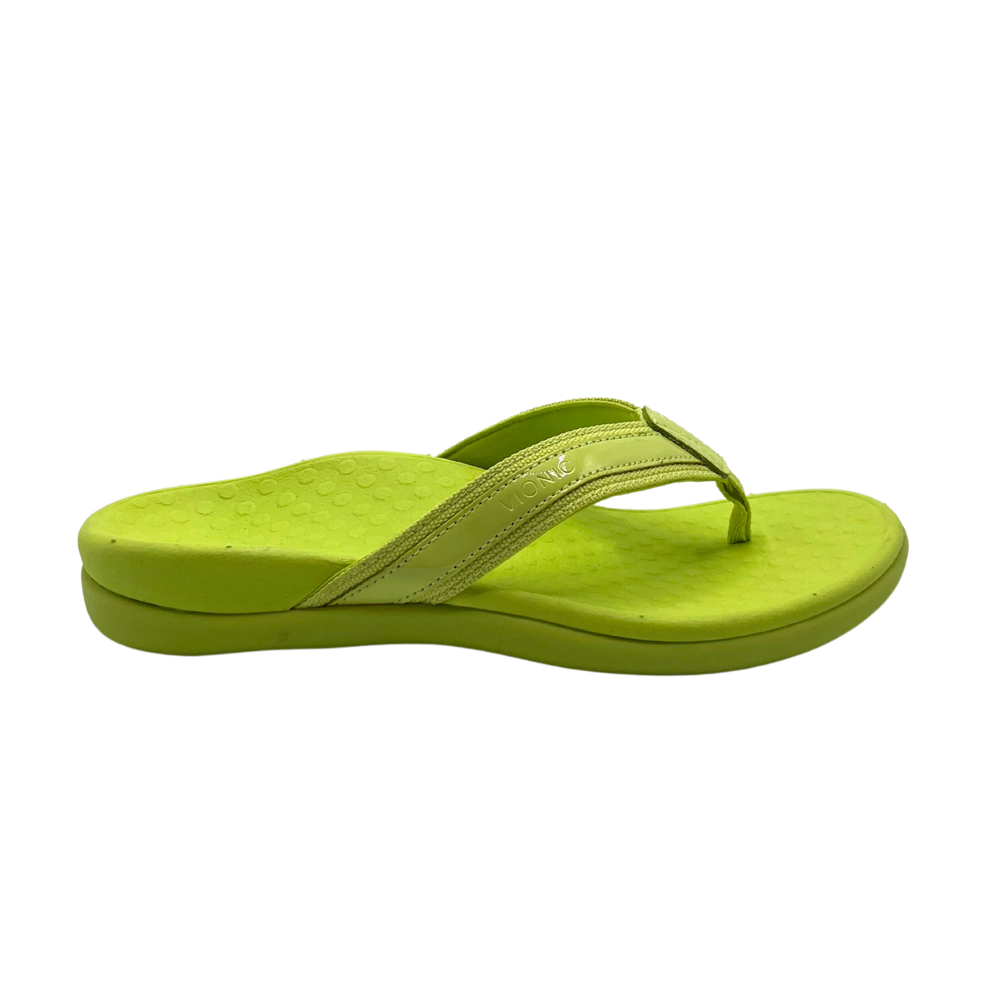 Outside view of a toe post sandal shown in a bright green.  Nice wide straps around the foot for stability.