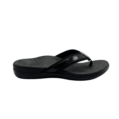 Outside view of a flip flop sandal in black.  Shows the contoured footbed with great arch support