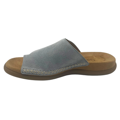 Inside view of light blue sandal with supportive footbed.