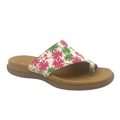 Angled side view of a slip on style sandal with a toe loop in front.  Anatomical footbed