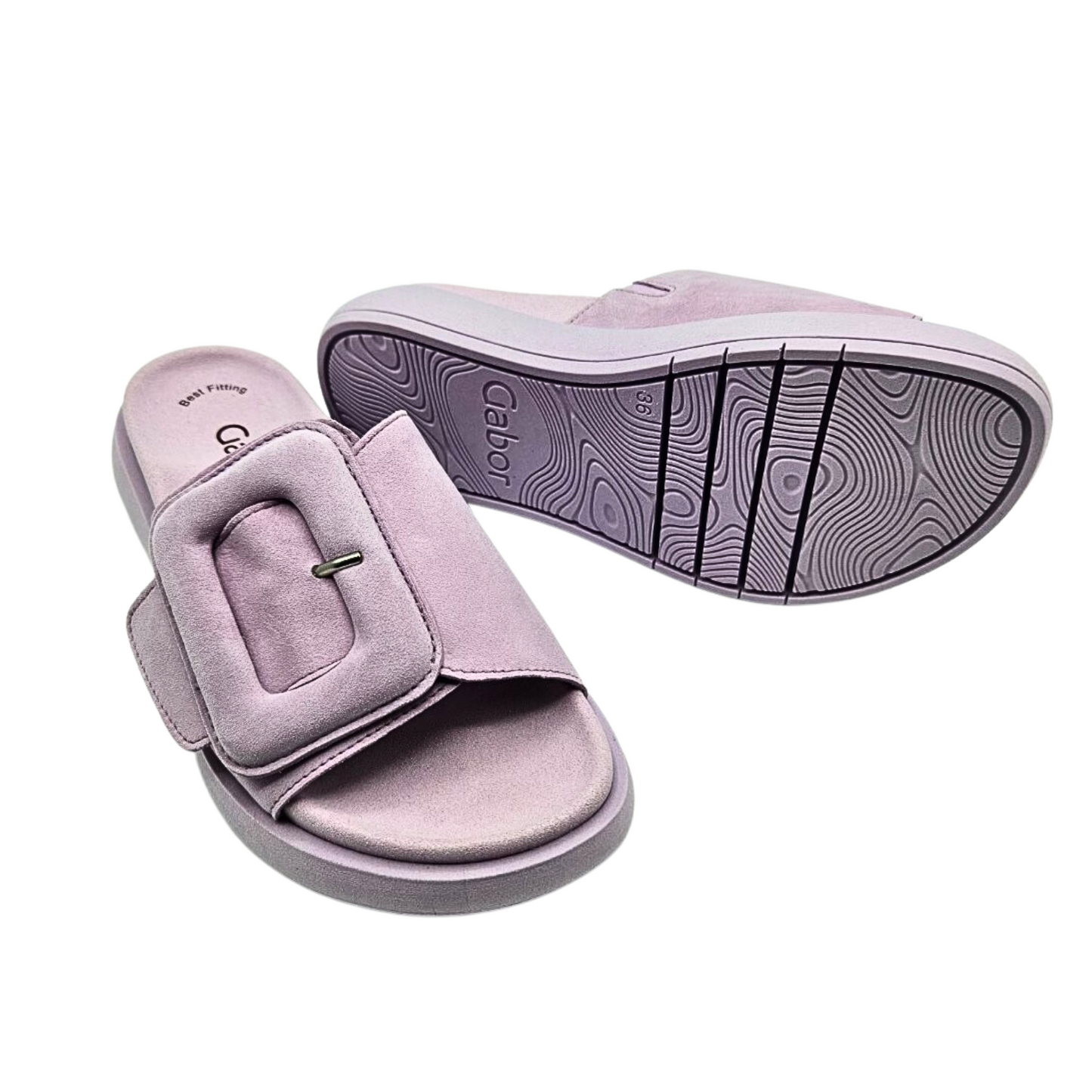 Angled side view of right shoe and sole of left.  Slides by Gabor called Hanover.  Wide, luxurious nubuk strap across all of forefoot, open toe and open heel.  Large decorative buckle slightly off center to the outside