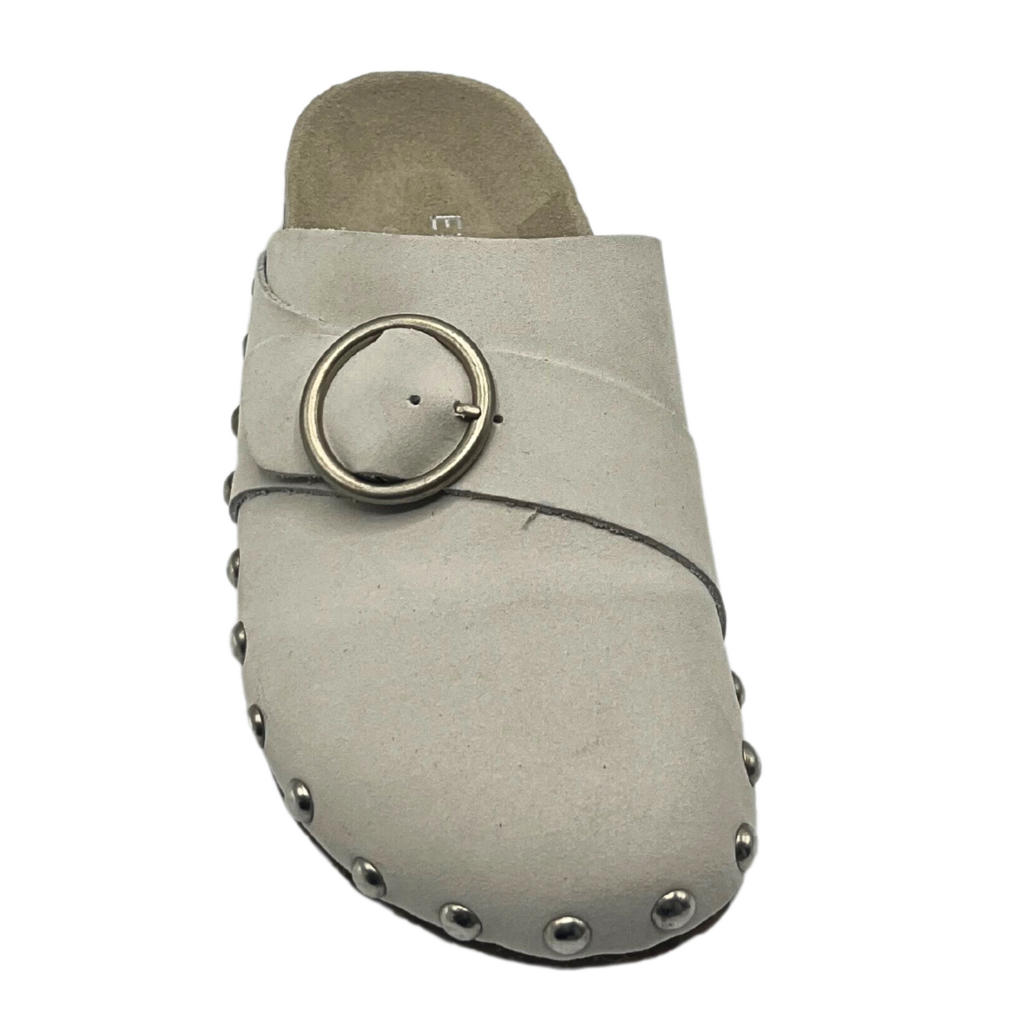 Top down view of a flat mule done in a neutral cocnut color.  Closed toe with studded details around the sole.  Buckle adjustment at top strap