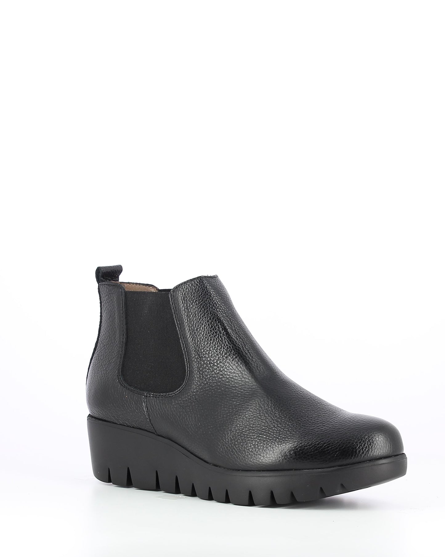 A black leather boot with a low, black wedge heel and black elastic side cut out is pictured in profile.