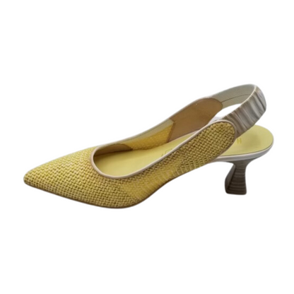 Inside view of yellow slingback pump.  Pointed toe and textured leather  Slip on style features a contrsasting white leather elastic on heel strap.