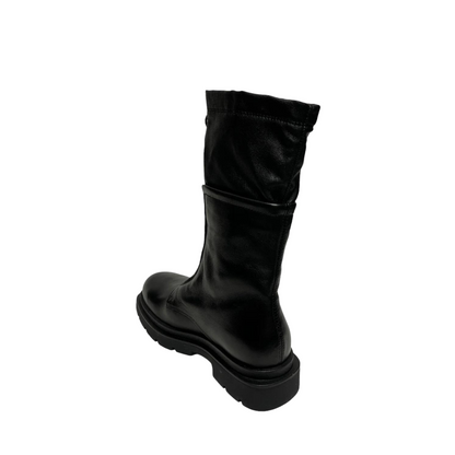 Rear angled profile of the Mjus Lucca Boot in the colour Black.