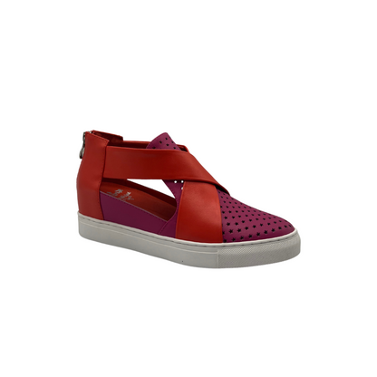 Minx Donatella in the coral colourway is constructed with a wedge sole.