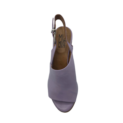 Top down view of a leather sandal with an open toe and adjustable heel strap.  Shown in lavender but also available in cloud white