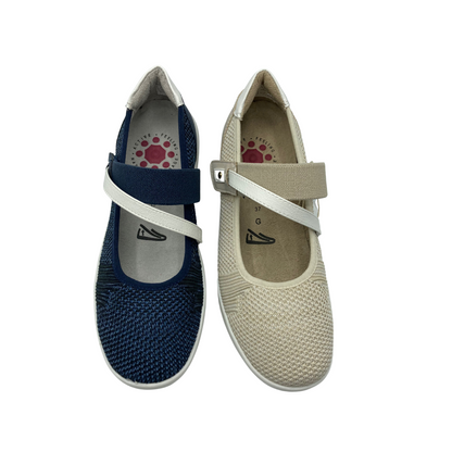Top down view of a non leather Mary Jane style shoe by Relife.  Softly rounded toe and 2 straps across foot - one heavier and one slimmer.  Shown in both cream and navy