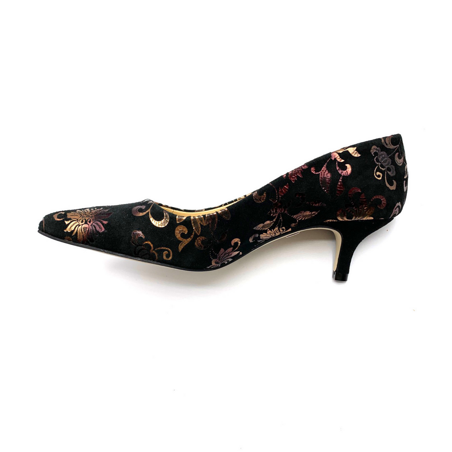 The side view of the shoe, showing the 2 inch kitten heel and the unique flower print.