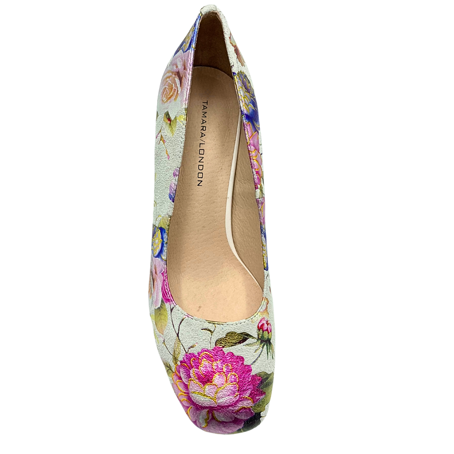 Top down view of a floral pump shoe.  Softly rounded toe.  Shown in a cream leather with painted floral details