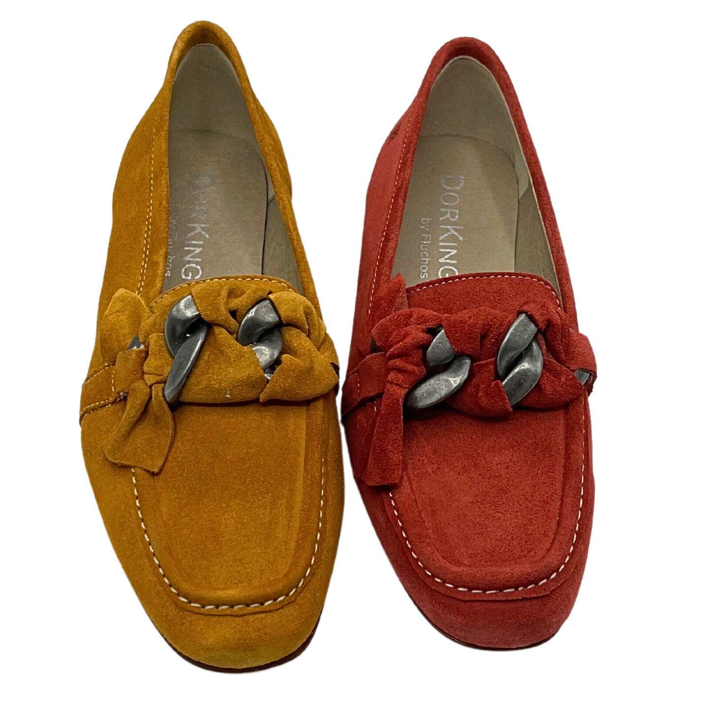 Top down view of a classic loafer done in a mustard and terracotta suede
