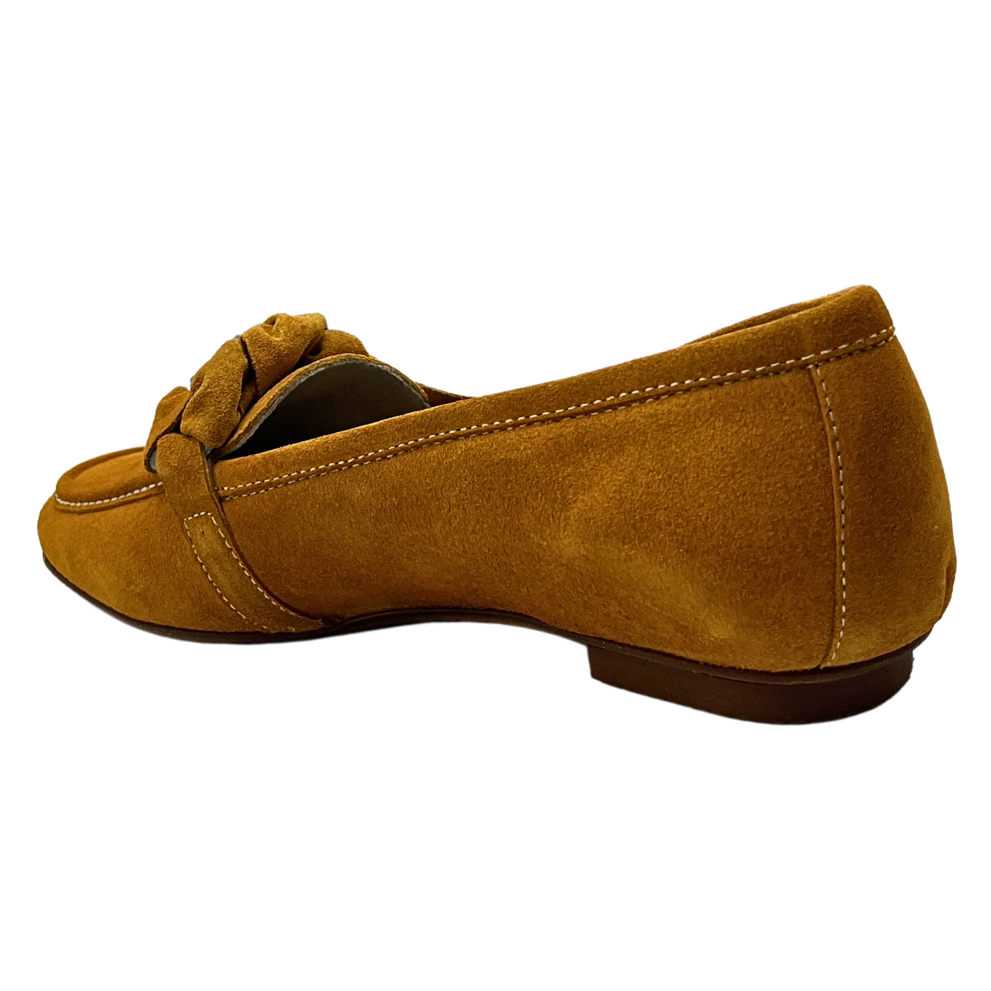 Angled rear view of a slip on loafer in a mustard suede.