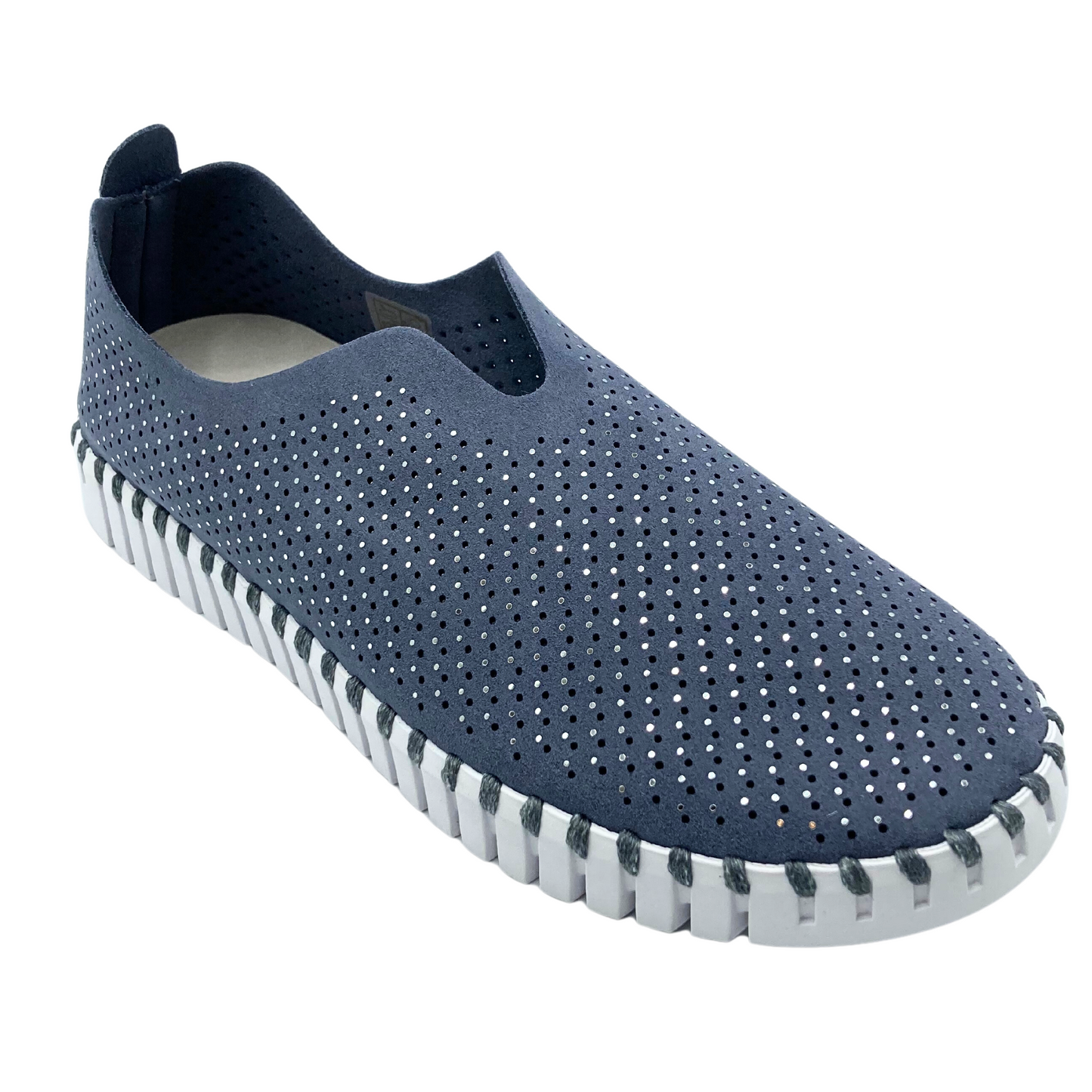 Angled side view of slip on sneaker in a blue/grey color with a white sole.  Recycled microfibre material with tiny laser holes and crystals.  White sole