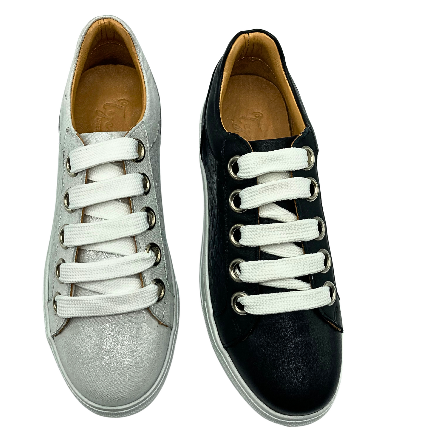Top down view of a fun sneaker with a shimmery finish to the leather.  Shown in black and light silver with white laces