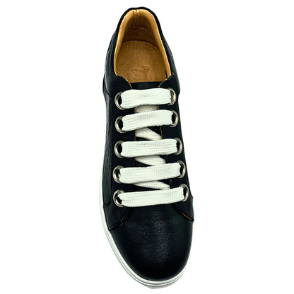 Top down view of a black leather sneaker with wide white laces.  Leather lined inside as well.  Bit of a shimmer to the leather
