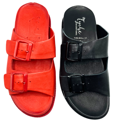 Top down view of a leather walking sandal.  Shown in black and red
