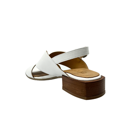 Angled rear view of Bueno Gabby sandal in white.  Low block heel, adjustable ankle strap