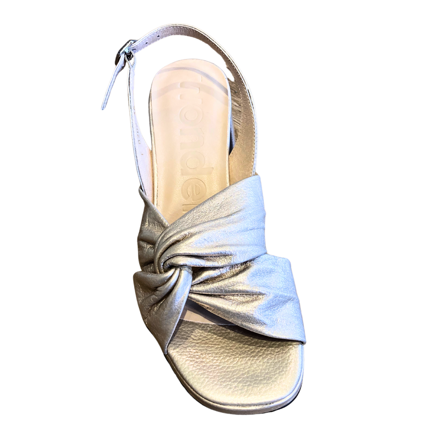 Top down view of open toe sandal in a platinum leather.  Soft leather is wrapped over itself on outside.  Heel strap has adjustable buckle