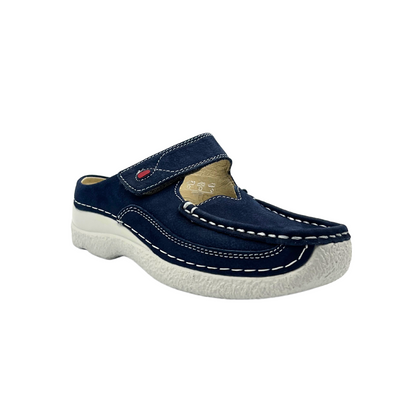 Angled front view of slip on loafer with a sporty sole.  Upper is a dark blue with contrasting white stitching and sole is whie rubber.