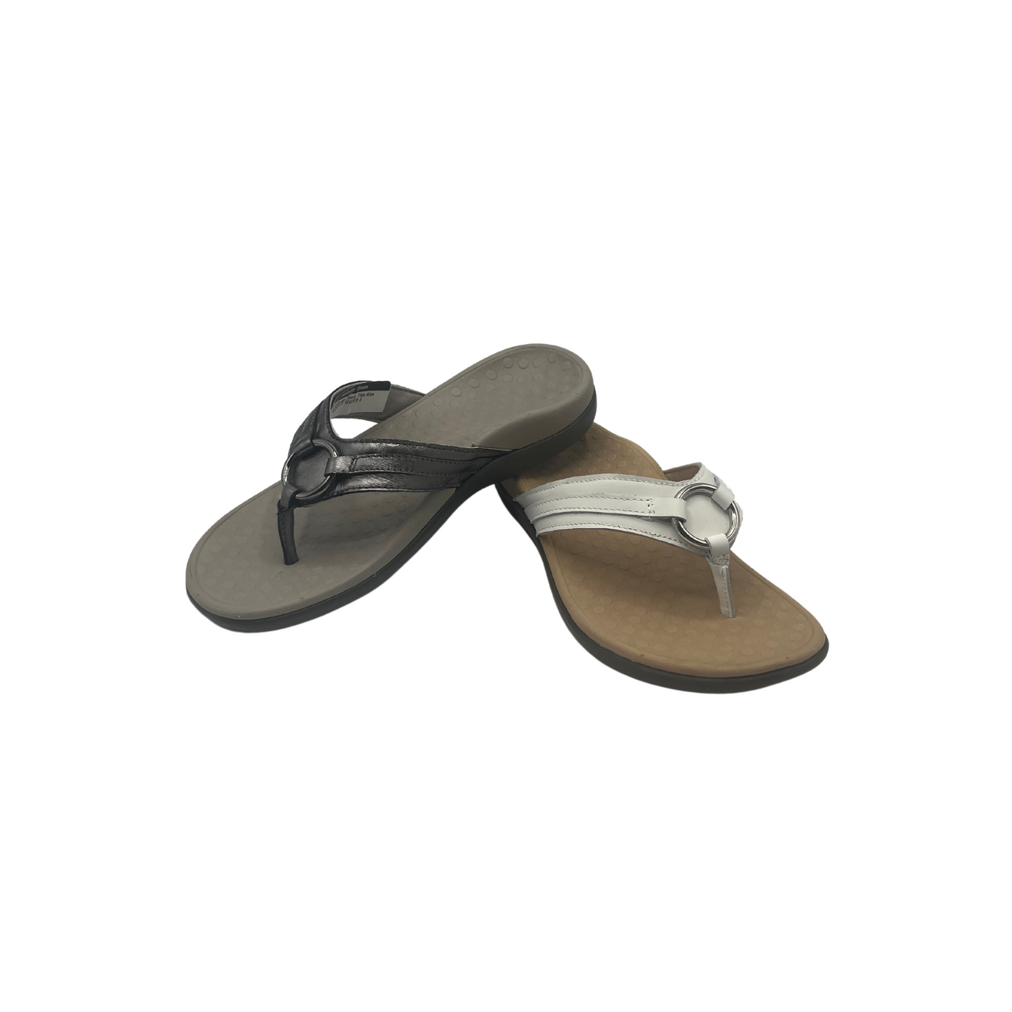 The Vionic Tide Aloe in pewter and white offers unique biomechanical orthotic footbed technology, providing superior arch support and cushioning for all-day comfort. 