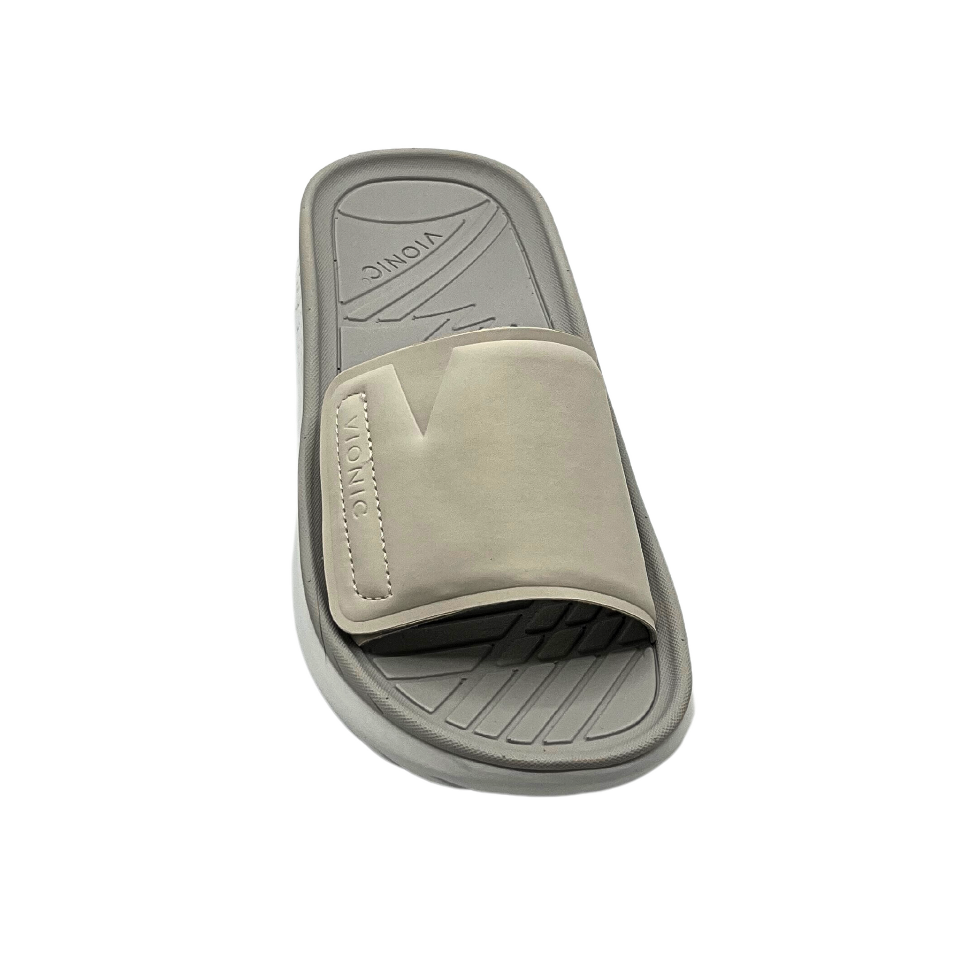 Top down view of a water friendly slide with a supportive footbed.  Two-tone with taupe/grey on top and a light cream on sole.  One strap across forefoot with a velcro tab to adjust it to fit