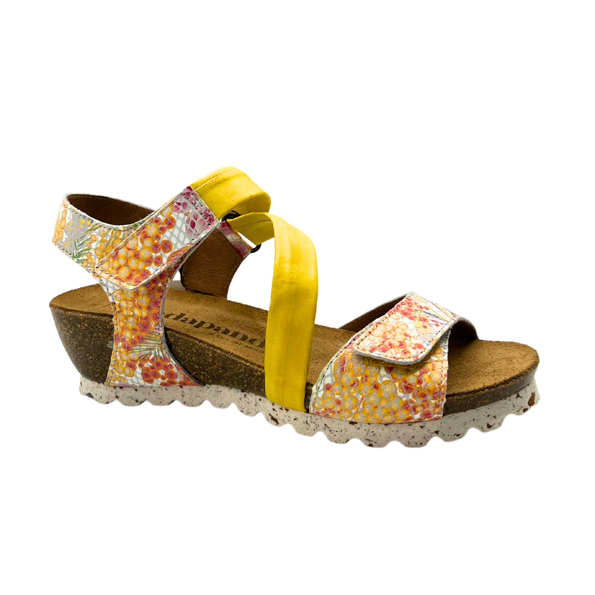 Angled side view of a low wedge sandal.  Good, solid construction with great support.  Shown in a floral pattern with a bright yellow strap across the top of foot