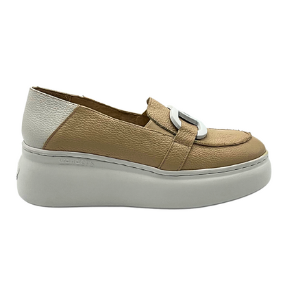 Outside view of a slip on loafer by Wonders.  White rubber sole.  Leather upper is taupe all over except for heel wrap which is white