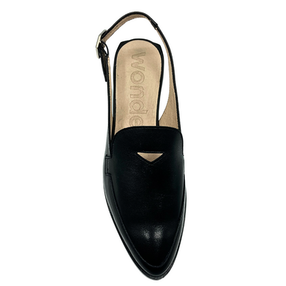 Top down view of slingback loafer in black leather.  Softly pointed toe and peek a boo opening at top of foot
