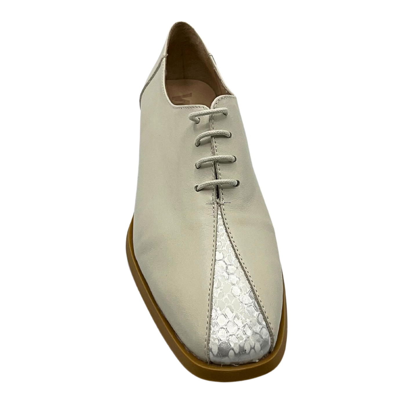 Top down view of a classic tie up loafer in a light taupe.  A sliver in front has a surprise faux snakeskin detail