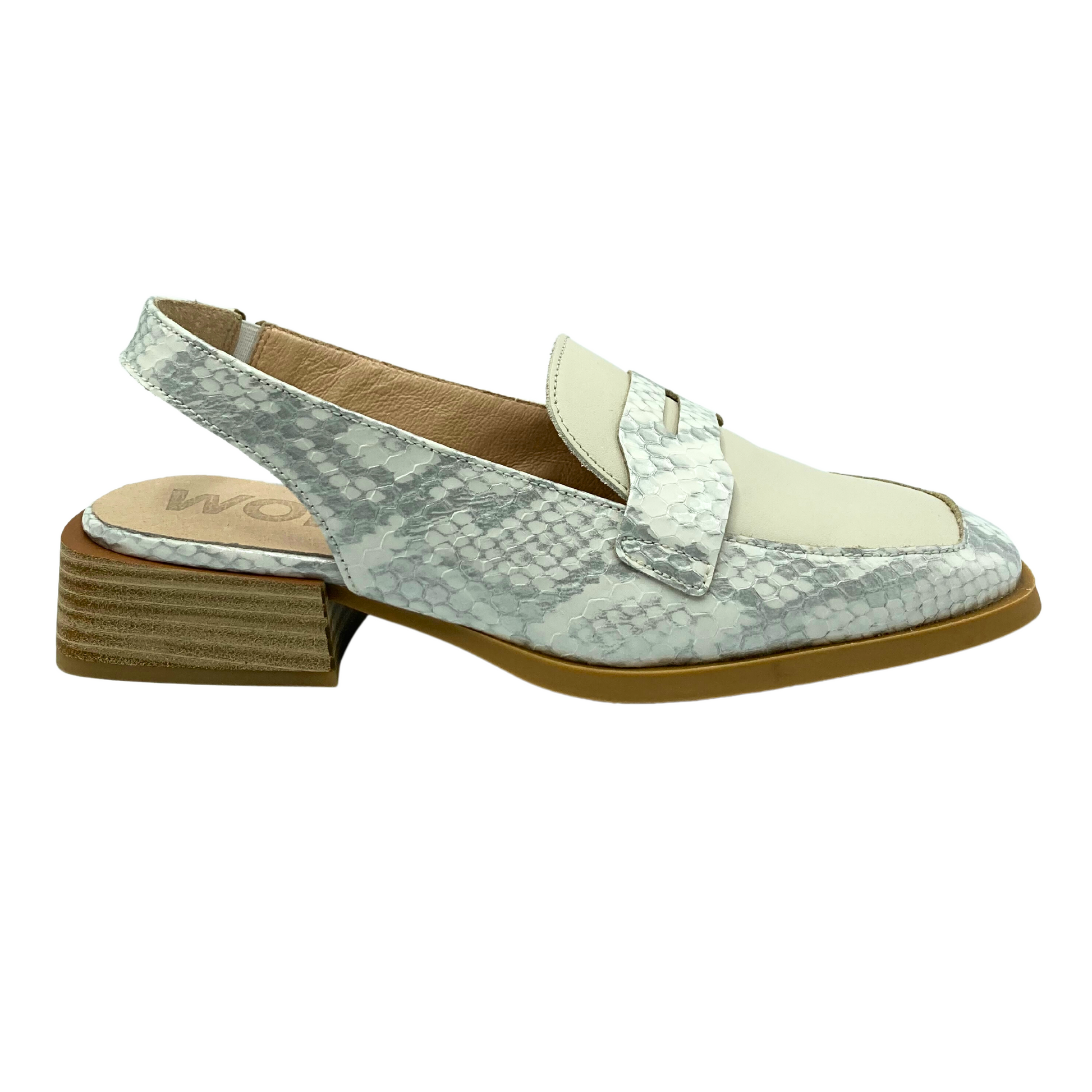 Outside view of a slingback loafer.  Upper is a faux snake in grey white with a taupe panel down front.