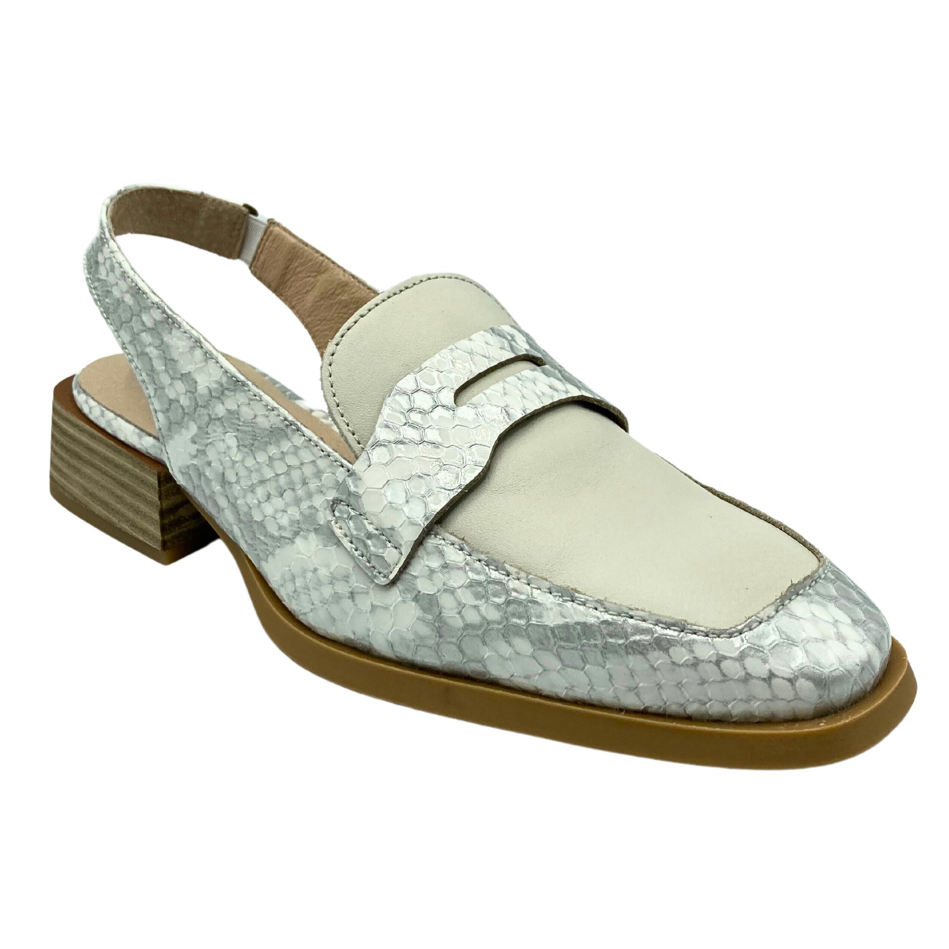 Angled front view of a slingback loafer.  Shown in a faux snake/taupe combination