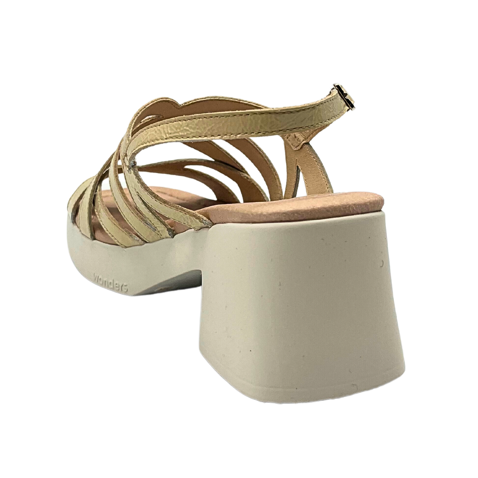 Angled rear view of a strappy sandal with chunky rubber sole