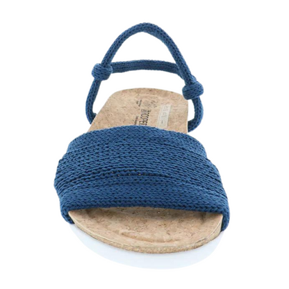 The front of the navy blue knit sandals is pictured showing the cork sole and the front and back bands.